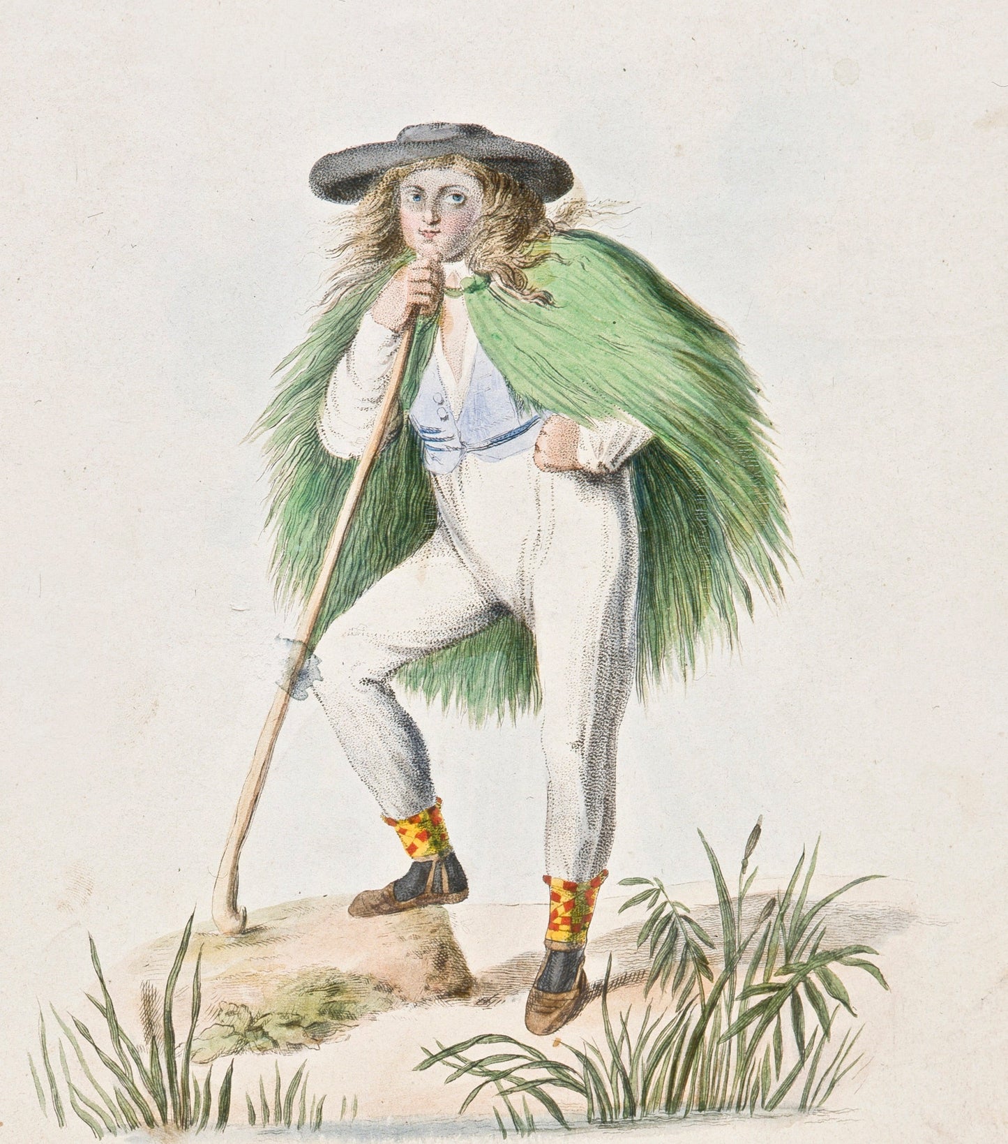 Der frisch restaurierte sog. Grasmantel und weitere Objekte im Depot des Volkskundemuseums Wien